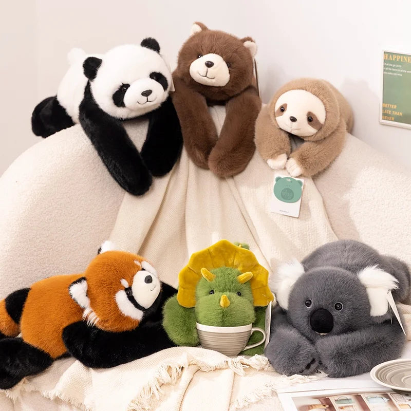 Huggo weighted plush companions resting on a bed — real product photo